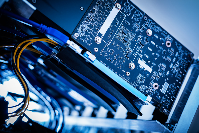 Bitcoin mining device in a close-up shot.